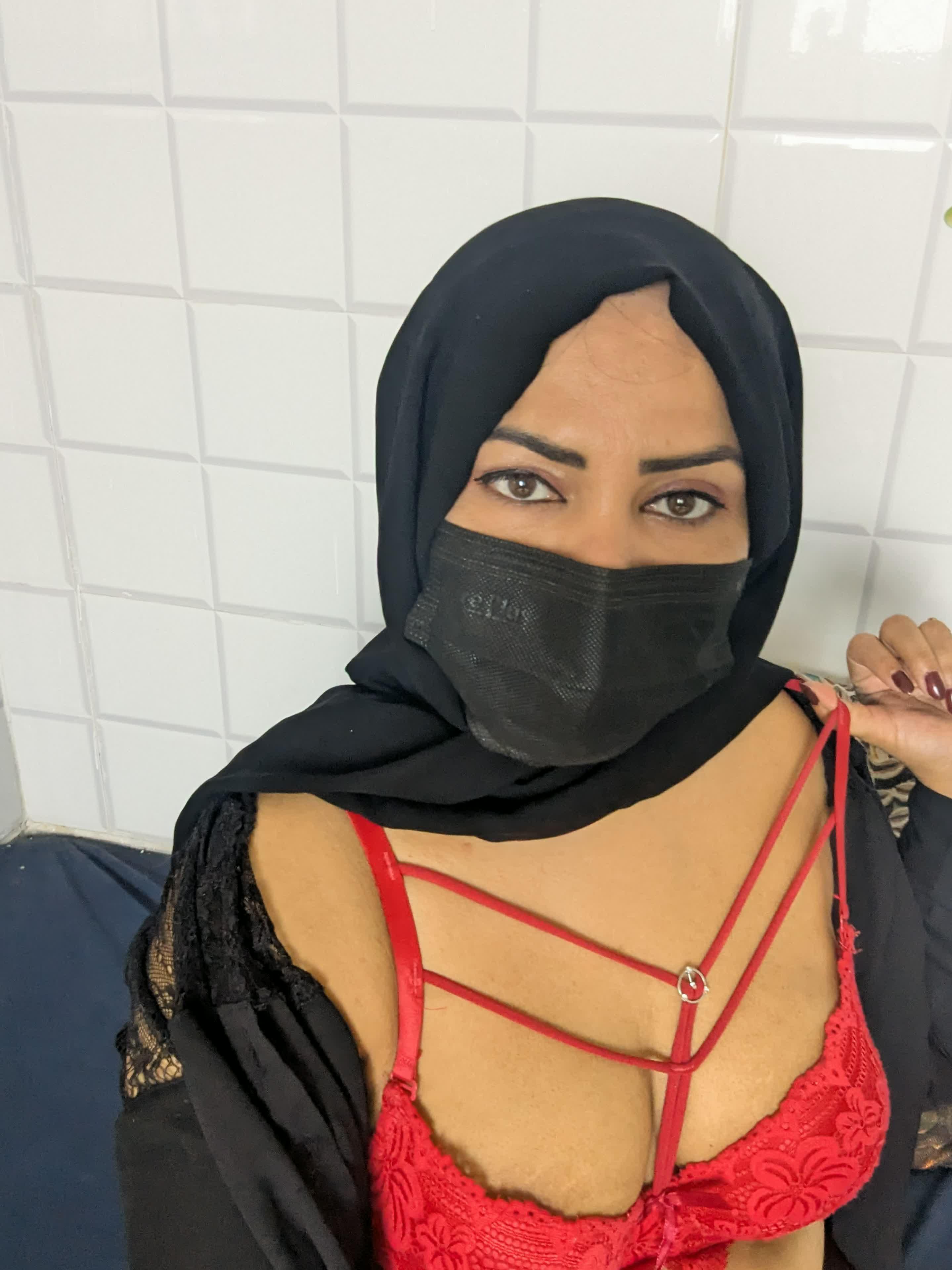 South Asian MILF in hijab teases her thick curves for you