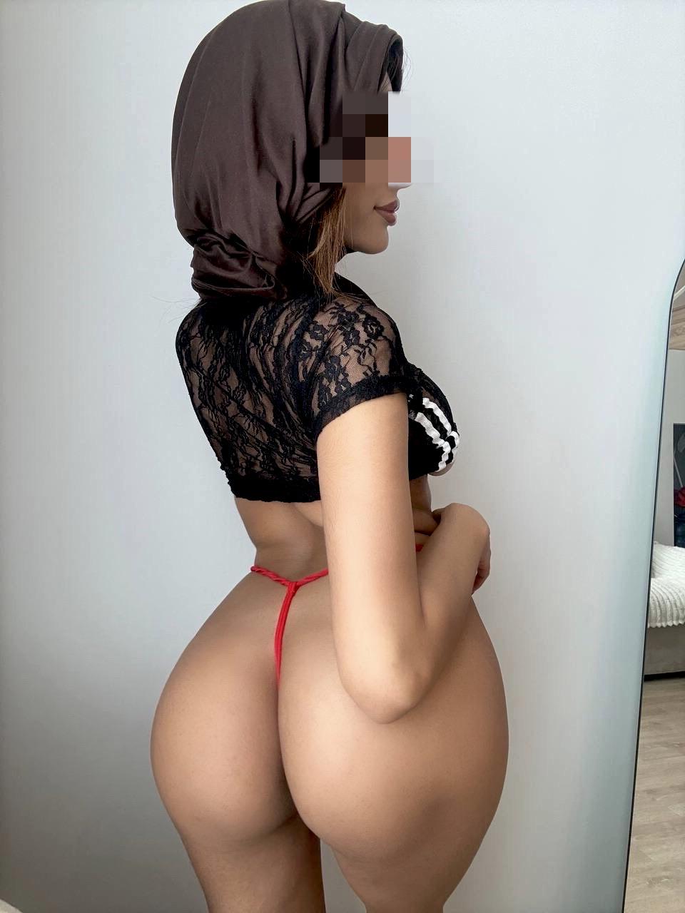 Desi MILF in hijab teases with thick curves and hairy pussy