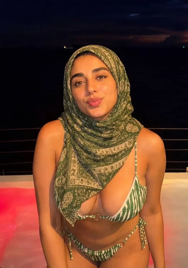Hijabi MILF strips hijab on or off for raw arab homemade tease
