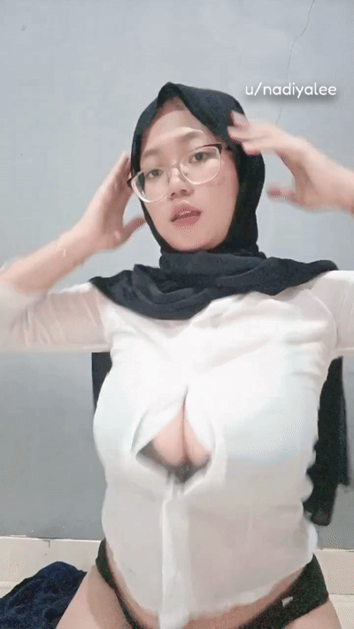 Pakistani MILF strips out of work clothes into slutty hijab lingerie